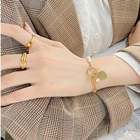 Bracelet pour femme en acier inoxydable plaqué or 18 carats PVD, avec maillons épais, fermoir à bascule, perle d'eau douce et breloque cœur en zircon cubique