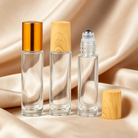 Flacon à bille de luxe rechargeable pour huile de parfum, petit format rond, 10 ml, en verre, avec bille en acier inoxydable pour huiles essentielles