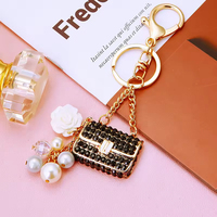Porte-clés de luxe en strass en gros, mini-pendentif de sac, accessoires de mode en cristal pour voiture, porte-clés en métal, cadeau pour femme