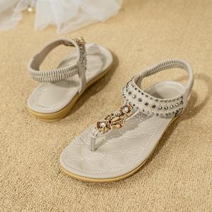 Sandalias de Moda Bohemia Primavera Verano 2026 para Mujer, Diseño de Lazo con Pedrería y Flores, Planas, Suaves, Versátiles, para Vacaciones y Playa - Product Image 1