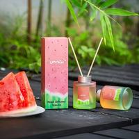 Diffuseur à bâtonnets parfumé à la pastèque, bouteille en verre dégradé avec bâtonnets en rotin naturel pour rafraîchir l'air de la maison et des hôtels