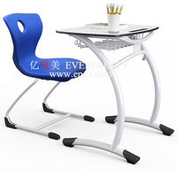 Mobilier d'étude ergonomique de haute qualité pour salle de classe, bureau et chaise en bois au design moderne avec panneau frontal pour écoliers