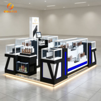Kiosque de vente de cosmétiques de luxe, présentoir en verre avec éclairage LED, table de présentation de parfums à vendre