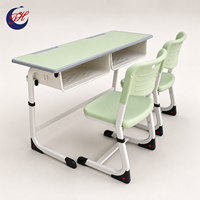 Mobilier scolaire de haute qualité pour les salles de classe : bureaux et chaises doubles en métal réglables en hauteur pour les élèves.
