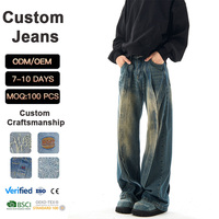 Pantalon décontracté en jean délavé style artisanal, coupe droite ample avec micro-déchirures et motif ondulé, vente en gros