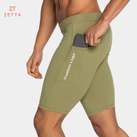 Shorts de performance pour hommes OEM personnalisés, extensibles, doux, respirants, à compression, mi-longs, avec poche et taille élastique