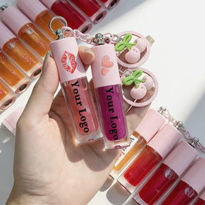 Gloss à lèvres brillant effet <span class=keywords><strong>miroir</strong></span> coloré avec applicateur jumbo en forme de <span class=keywords><strong>pied</strong></span> de biche, capuchon <span class=keywords><strong>blanc</strong></span> <span class=keywords><strong>sur</strong></span> tube transparent, emballage unisexe - Product Image 1