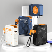 Cargador y Banco de Energía 2 en 1 de 10000 mAh y 10 W |   Cable de Carga Integrado PD de 20 W Máx. con Cordón |   Con soporte para teléfono