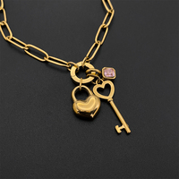 Pulsera de Cadena de Acero Inoxidable Chapada en Oro de 14K para Mujer, con Cierre de Corazón, Llave y Circonita Rosa, Joyería Emanco