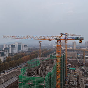 Grue à tour à plateau plat DAHAN QTZ125(6015) avec une capacité de levage maximale de 10 tonnes et une hauteur d'ancrage de 200 m à vendre - Product Image 5