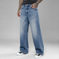 Jean évasé bleu clair délavé pour homme, coupe ample vintage avec effet vieilli, style streetwear