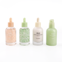 Flacon compte-gouttes en verre givré de 30 ml et 50 ml avec bouchons multicolores, flacons de sérum de luxe avec pipette, emballage cosmétique pour huiles essentielles