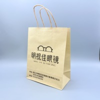 Sac en carton kraft écologique haut de gamme avec poignée en corde de coton et revêtement UV pour les magasins d'optique et l'emballage de cadeaux de lunettes