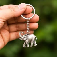 Porte-clés éléphant 3D réaliste et noble, thème safari, breloque vintage argentée pour sac, cadeau souvenir porte-bonheur