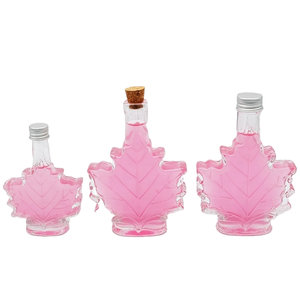 Bouteilles de diffuseur en verre en forme de <span class=keywords><strong>feuille</strong></span> <span class=keywords><strong>d</strong></span>'érable de luxe de 50ml 100ml 250ml pour sirop contre la toux vin whisky Gin boisson avec couvercle en aluminium - Product Image 4