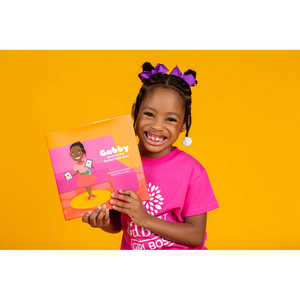 Gabby inventa el lazo perfecto para el cabello, libro infantil de tapa dura con sobrecubierta. - Product Image 1