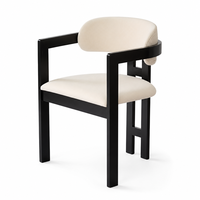 Fauteuil à cadre noir avec assise et dossier rembourrés crème pour la restauration, les hôtels, les salons, collection de meubles d'intérieur