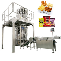 Machine d'emballage verticale entièrement automatique certifiée CE pour la fabrication, le remplissage et la fermeture de sacs, adaptée à divers matériaux granulaires.