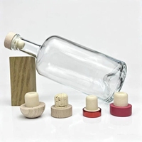 Bouteille en verre transparente vide pour vodka, vin, gin et spiritueux, avec base lourde, col long, épaule arrondie et capacité personnalisée OEM