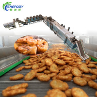 Chaîne de production de friture continue Shepody certifiée CE pour produits à base de pâte (Bakso Goreng, gâteaux de poisson, Tater Tots, Coxinha) – Capacité 100 kg/h