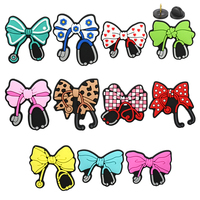 Tendance 2025 : Breloques et épingles en PVC motif dessin animé, 2,5-3,5 cm, pour sacs