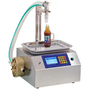 Máquinas de llenado de miel de alta calidad con botella de bomba Máquina de llenado y pesaje de miel Dispensador de líquido pequeño semiautomático