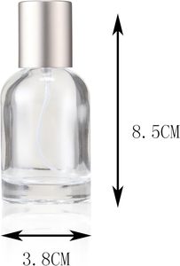 Vente en gros Bouteille de luxe en verre de parfum vide de forme ronde avec bouchon transparent en argent 30ml 50ml 100ml - Product Image 2