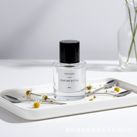 Flacons de parfum cylindriques en verre de 30 ml et 70 ml, finition givrée, impression sérigraphique, bouchons pulvérisateurs rechargeables, boîte de parfum