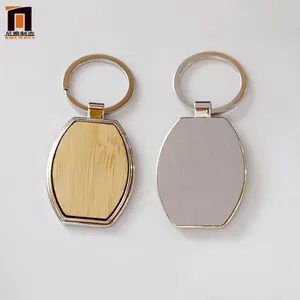 Vente en gros de porte-clés à sublimation Accessoires en bois Porte-clés en bois pour la gravure de cuir Porte-clés personnalisé en bois