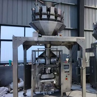 Machine de pesage, d'emballage, de remplissage et de scellage automatique multi-têtes de haute précision pour aliments surgelés, noix, plastique et papier