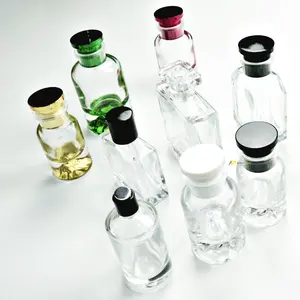 新しいデザインエレガントでユニークなガラス瓶カスタムロゴ化粧品香水瓶ボックス付き