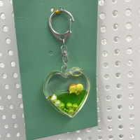 Porte-clés liquide en forme de cœur, figurine de dessin animé, acrylique transparent, perles flottantes 3D, cœur personnalisable, paillettes, décoration pour téléphone et sac