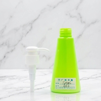 Logotipo personalizado 120ml Envase cosmético Botella de champú de plástico PET con tapa de bomba de loción de prensa