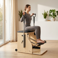 Chaise de Pilates en bois d'érable durable avec poignées réglables et ressorts à pédale pour l'entraînement à domicile et en studio