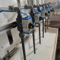 Machine de remplissage semi-automatique anti-corrosion à flux gravitaire pour détergent lessive et produits de nettoyage ménager