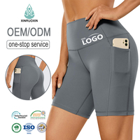 Shorts de yoga taille haute avec couture avant, shorts de yoga moulants rehausseurs de fessiers, séchage rapide, respirants, coupe ajustée, poches latérales, shorts de sport