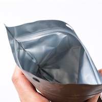 Sachet Doypack personnalisé à haute barrière pour l'emballage de grains de café torréfiés, avec trou de suspension rond