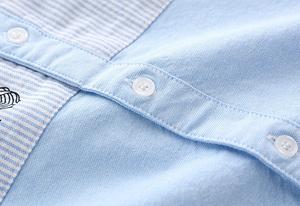 Achetez directement auprès du fabricant chinois de nouvelles chemises polo amusantes pour enfants en coton Oxford à blocs de couleur et à manches raglan. - Product Image 5