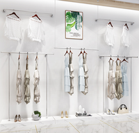 Présentoir de magasin de boutique en acier inoxydable avec porte-vêtements en or Porte-vêtements d'occasion pour la vente de centre commercial