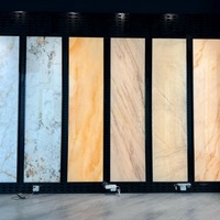Revêtement mural en pierre artificielle rétroéclairée de luxe moderne, écologique et ignifuge pour la réception d'hôtel