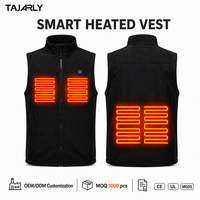 Gilet chauffant sans manches, col montant, poches latérales, fermeture éclair centrale, bouton d'alimentation, softshell, compact et facile à transporter