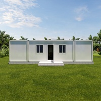 Maison conteneur de luxe préfabriquée démontable de 40 pieds, type flat pack, modulaire, avec 2 chambres, cuisine et séjour.