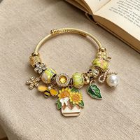 Bracelet Fanhua Jewelry Tiktok, best-seller, étanche, en acier inoxydable plaqué or, motif tournesol et abeille.