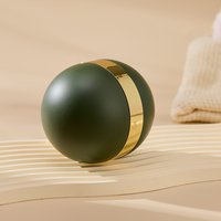 Pot cosmétique PP vert foncé en forme de boule de 50ml avec bouchon à vis vert et joint de traction à la main Conteneur de luxe pour soins personnels de la peau