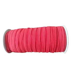 กอร์ดอนริบบิ้นขายส่งสูงยืดหยุ่น Spool สีดำ/ สีขาวริบบิ้นทอที่กำหนดเองถักเชือกยางยืดสำหรับจักรเย็บผ้าหูเชือก