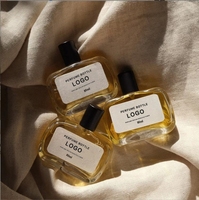 Buse de pompe à pression de 75ml Bouteille d'emballage cosmétique en verre transparent Bouteille de parfum à jet plat