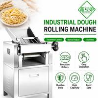 Machine à rouler la pâte industrielle en acier inoxydable avec rouleaux de précision et épaisseur réglable pour le traitement de la farine
