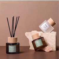 Vente en gros, bouteille vide ronde de 50ml, 100ml, 150ml, diffuseur d'arôme de roseau d'air de luxe avec capuchon en bambou