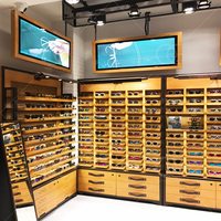 Présentoir de magasin de lunettes, vitrine moderne en verre, présentoir professionnel en bois, vitrine de magasin de lunettes de mode