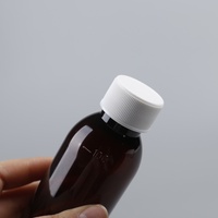 Fabricants chinois de flacons en plastique ambré pharmaceutique de 100 ml pour sirop contre la toux liquide avec gobelet